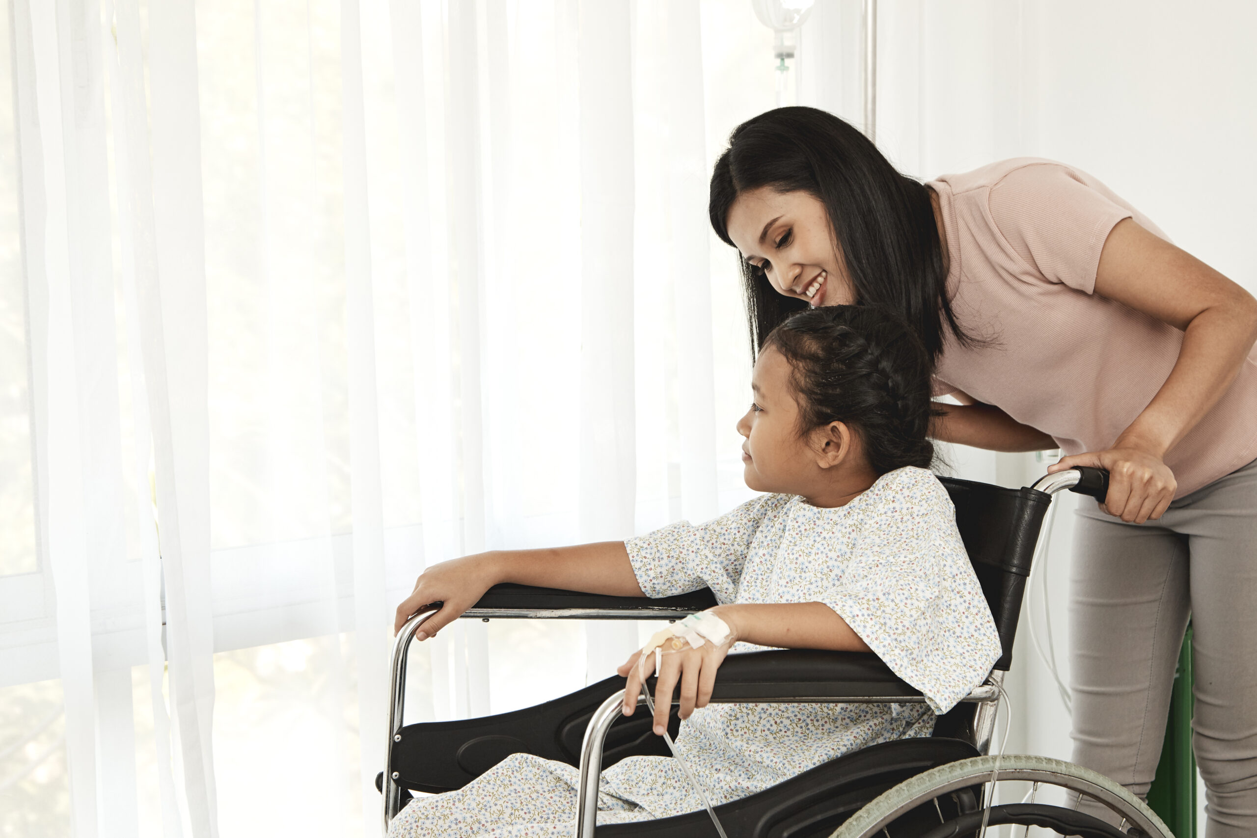 female-child-patient-wheelchair-scaled